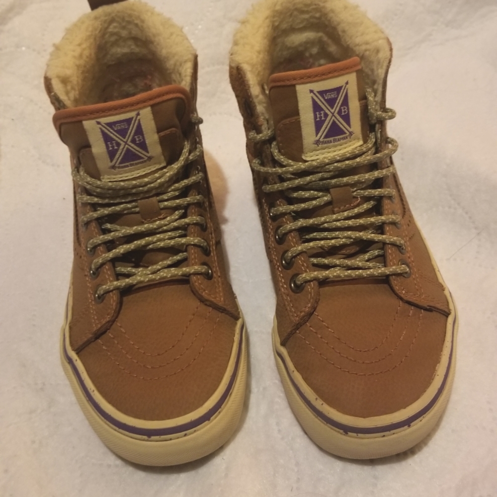Van's size 3.5 men and size 5 in women.
